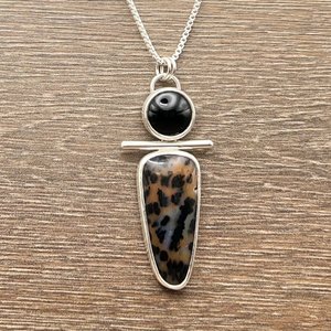 Black Onyx and Unknown Stone Pebble Pendant